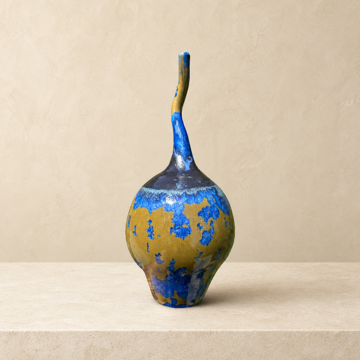 Rounded blue and gold crystalline-glazed bottle by Mark Barta