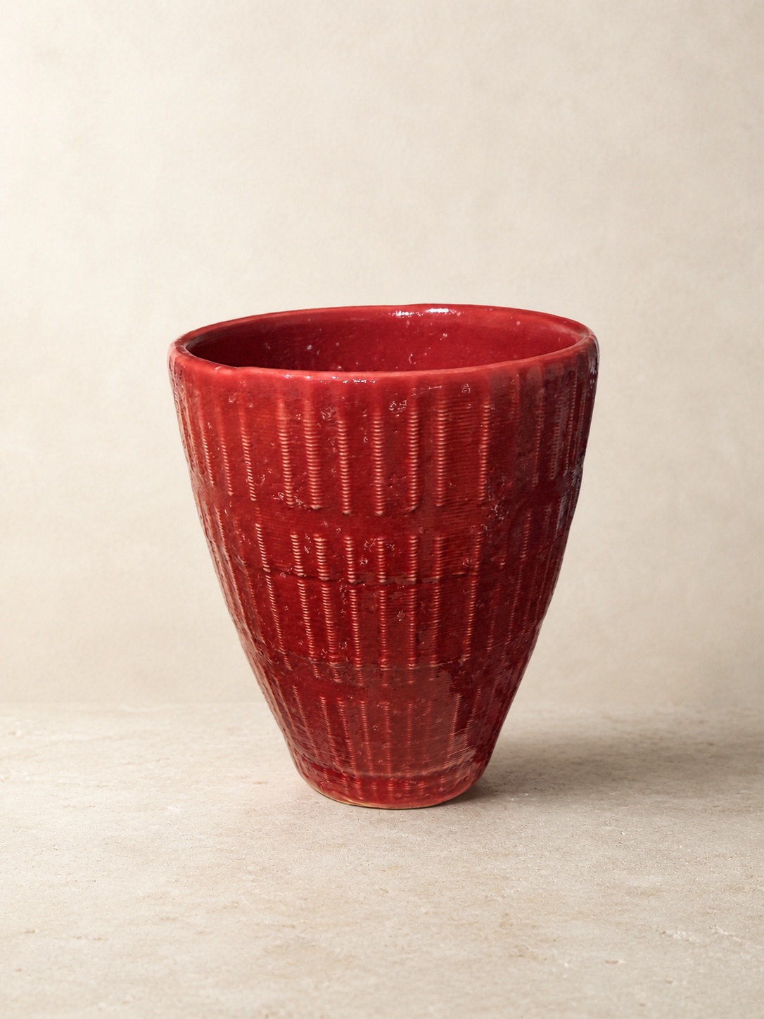 Deep red clay 3D-printed ceramic cup made with an Eazao X-1 Potter by Mark Barta